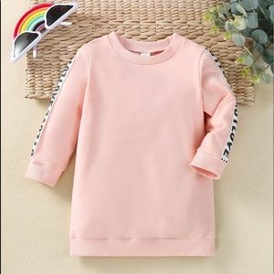 Baby pink crew neck sweater.